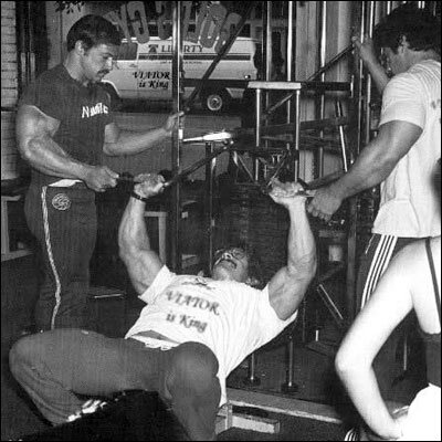 Mike Mentzer doing some Forced Reps on the Incline Chest Press With some assistance from Casey Viator , and Mike’s brother Ray.